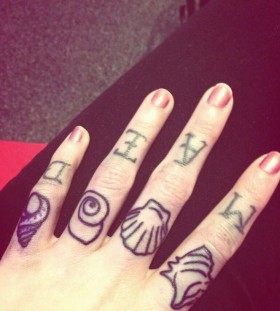 Sea shell knuckle tattoos