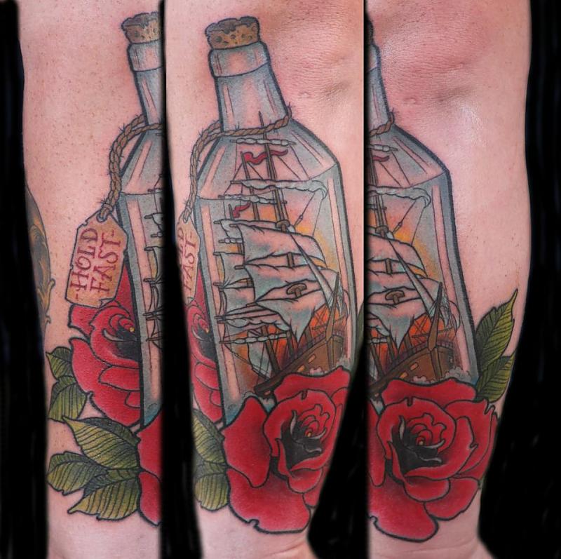 Ship in a bottle and rose tattoo