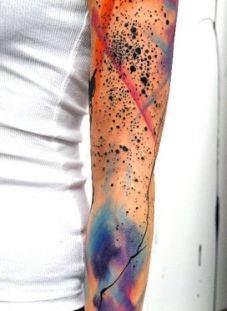 Simple arm's watercolor butterfly tattoo