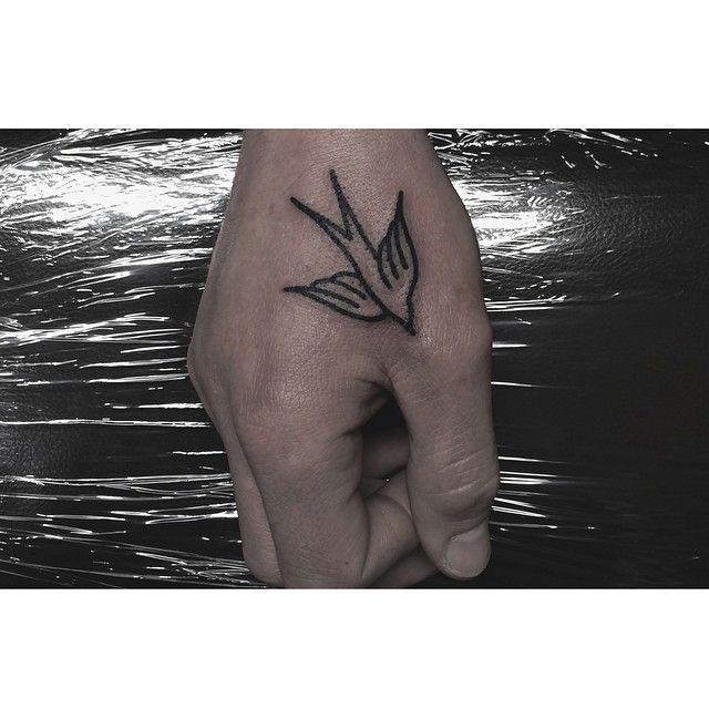 Simple bird tattoo by Charley Gerardin