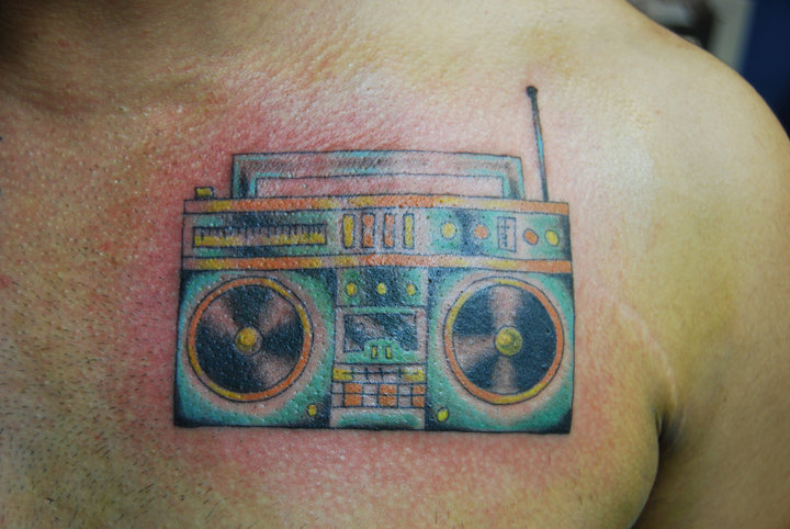 Simple boombox chest tattoo