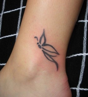 Simple butterfly ankle tattoo