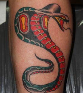 Simple coloured cobra tattoo