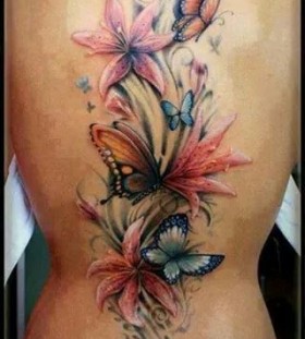 Simple flowers and watercolor butterfly tattoo
