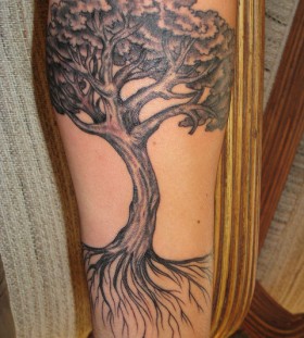 Simple oak arm tattoo