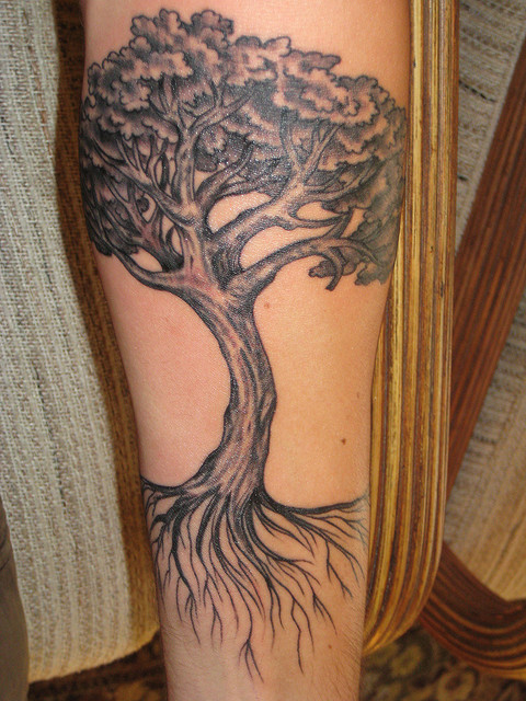Simple oak arm tattoo