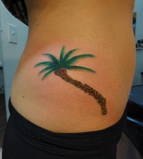 Simple palm tree side tattoo