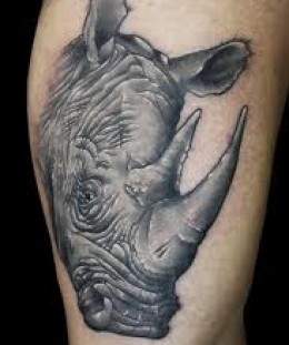 Simple rhino arm tattoo