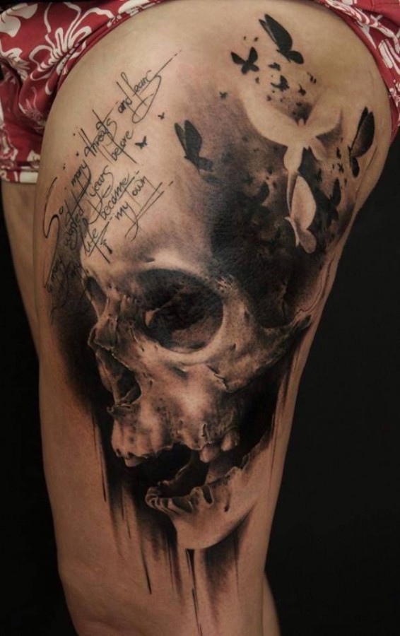 Skull and birds leg tattoo by Florian Karg