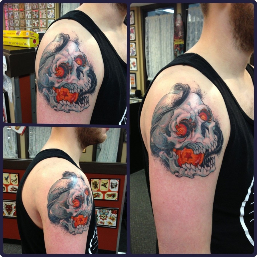 Skull and dragon ball tattoo