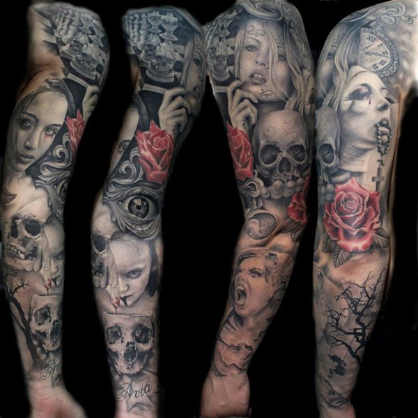 Skull and girls faces full arm tattoo