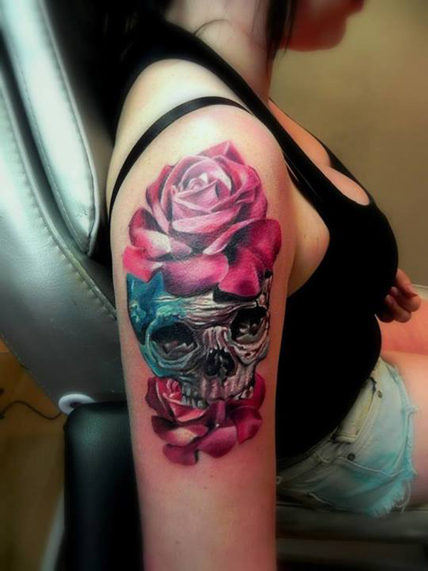 Skull and rose arm tattoo