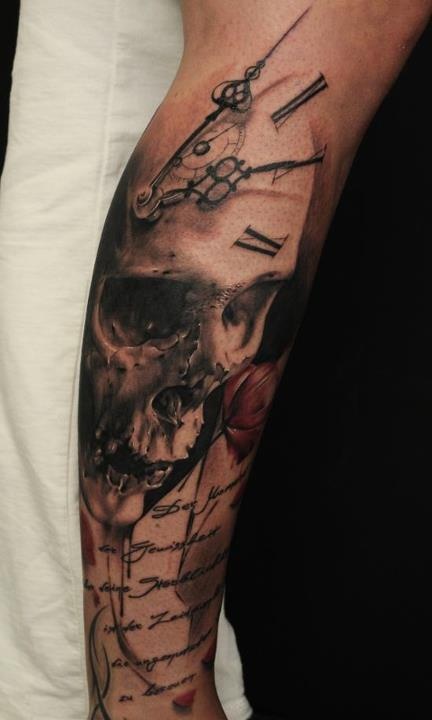 Skull clock arm tattoo