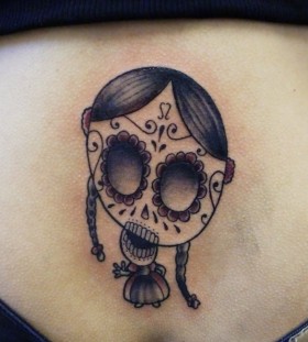 Skull face doll tattoo