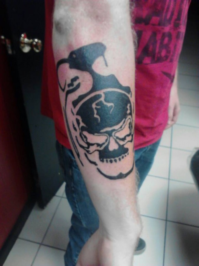 Skull grenade arm tattoo