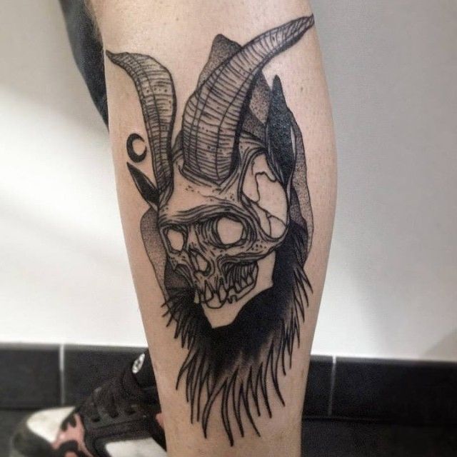 Skull with horns tattoo by Michele Zingales