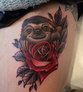 Sloth and rose tattoo