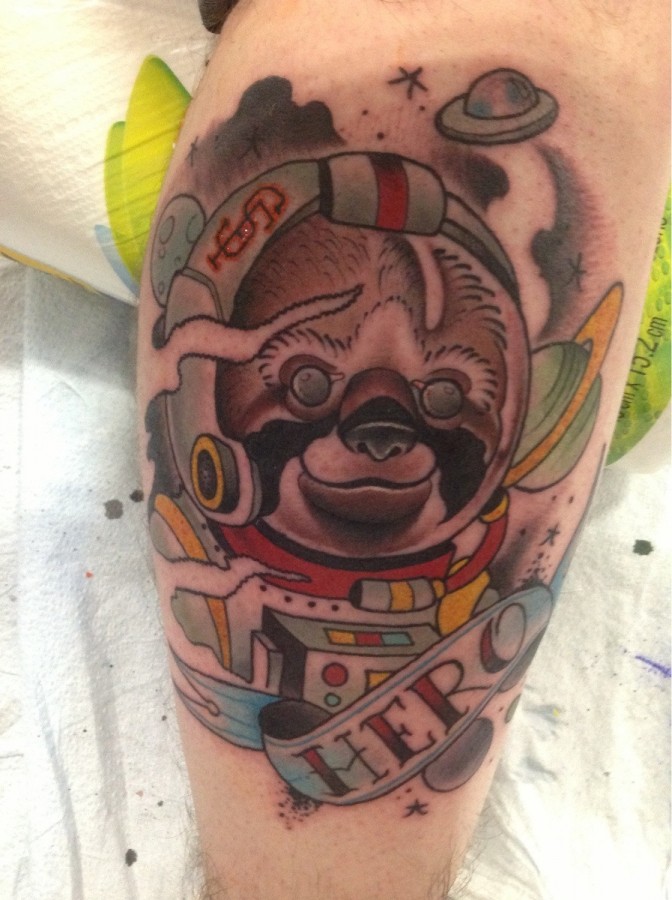Sloth spaceman leg tattoo