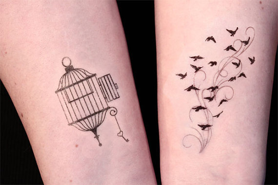 Small birdcage and key tattoo