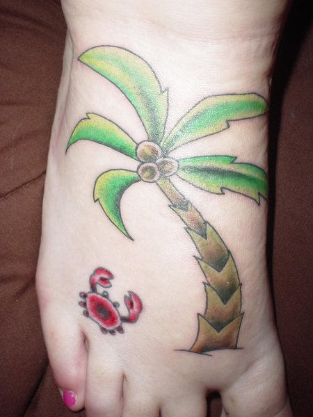 Small crab and palm tree tattoo
