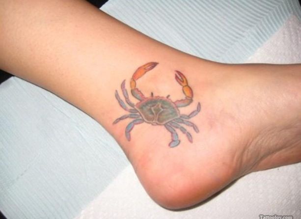 Small crab ankle tattoo