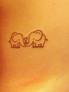 Small elephants family love tattoo