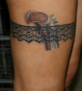 Small gun tattoo by Razvan Popescu