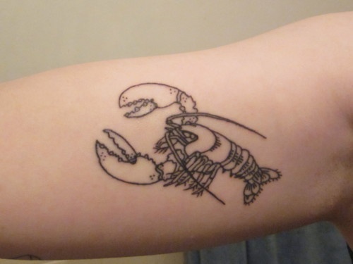 Small lobster arm tattoo