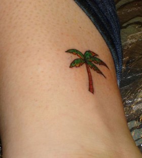 Small palm tree tattoo