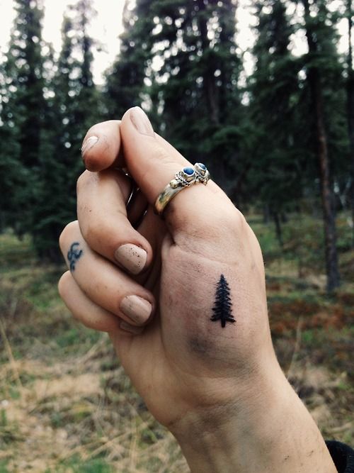 Small pine tree palm tattoo
