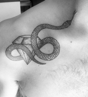 Snake and diamond tattoo