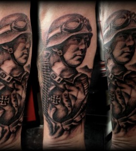 Soldier portrait arm tattoo