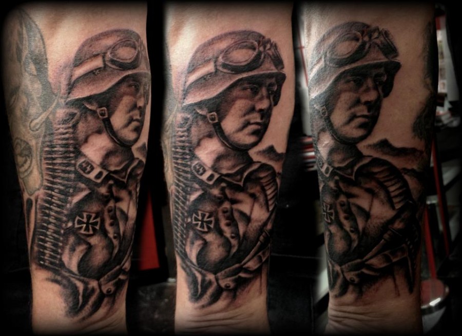 Soldier portrait arm tattoo