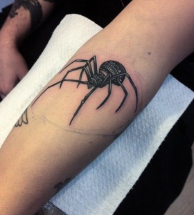Spider tattoo by Flo Nuttall
