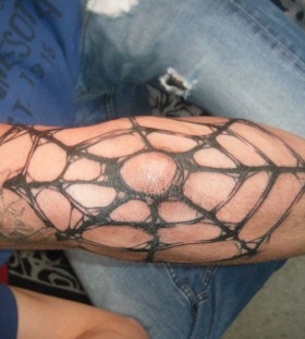 Spider web elbow tattoo