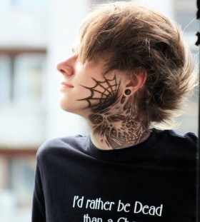Spiderweb face tattoo