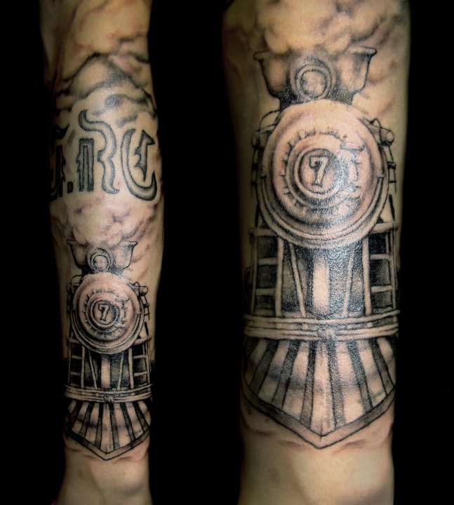 Steaming train arm tattoo