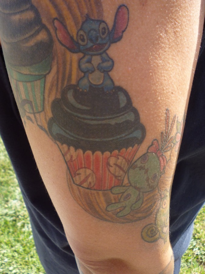 Stitch and cupcake tattoo