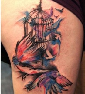 Stunning birdcage and birds tattoo