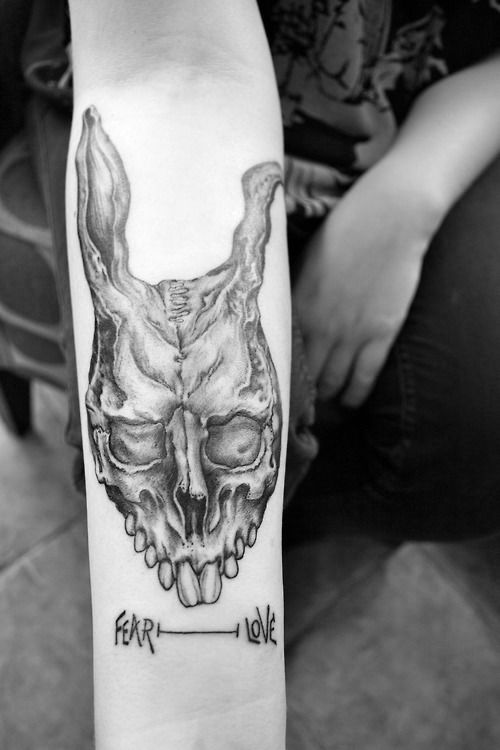 Stunning black and white scary tattoo