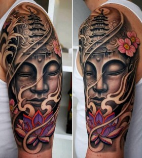 Stunning buddha arm tattoo