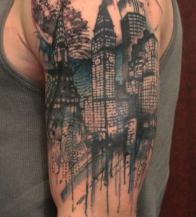 Stunning city arm tattoo