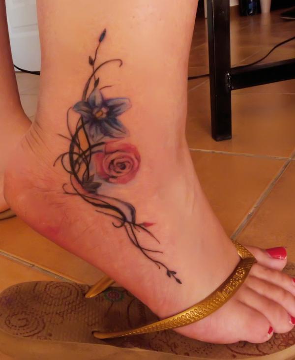 Stunning flowers ankle tattoo