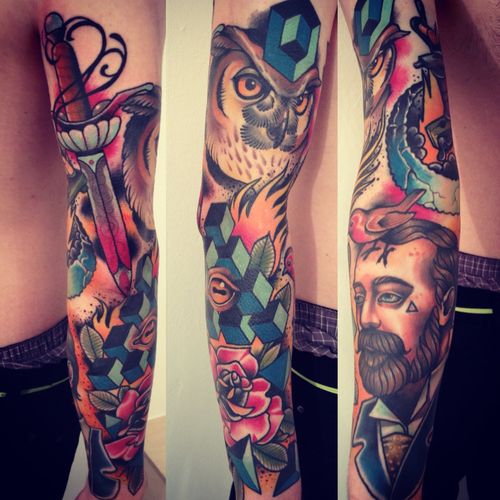Stunning full arm tattoo by Alex Dorfler