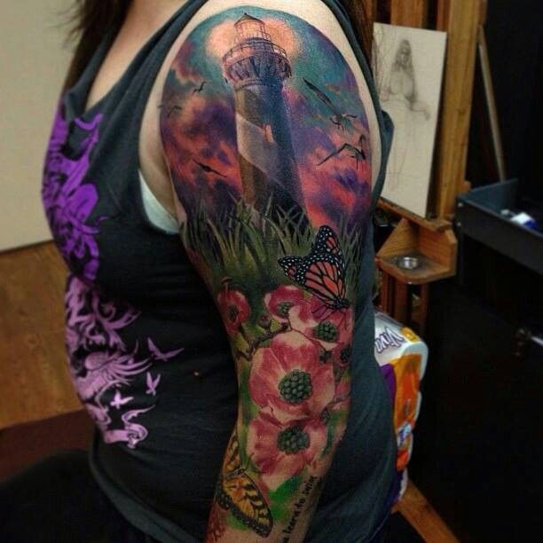 Stunning lighthouse arm tattoo