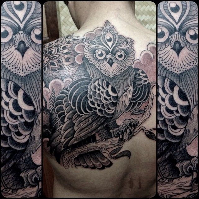 Stunning owl back tattoo by Pepe Vicio