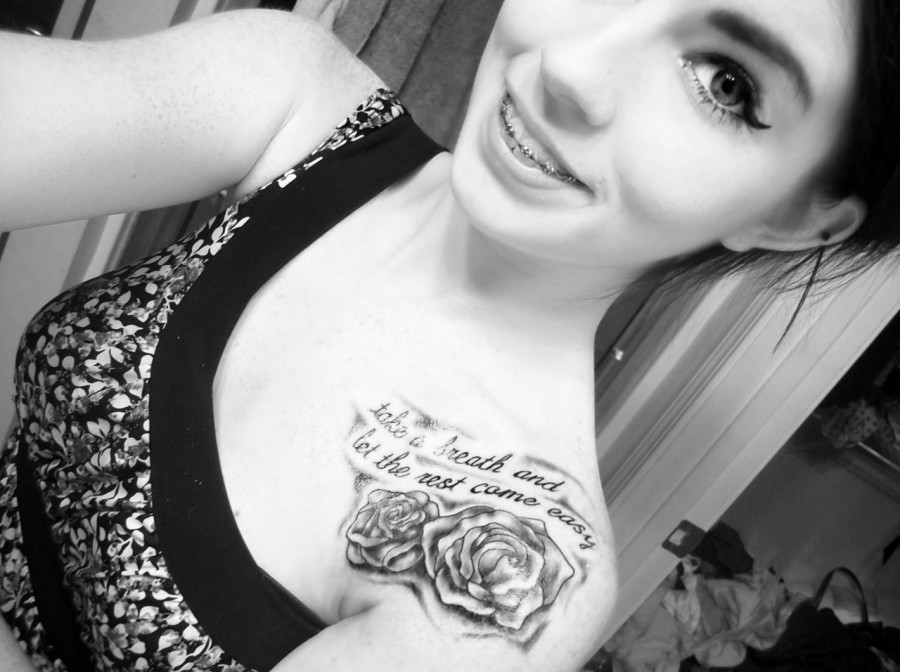 Stunning rose and quote tattoo