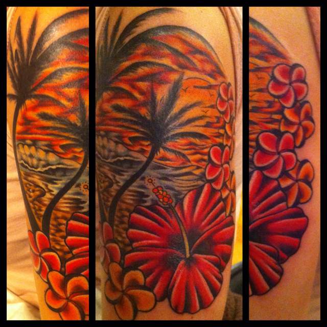 Sunset and flowers tattoo