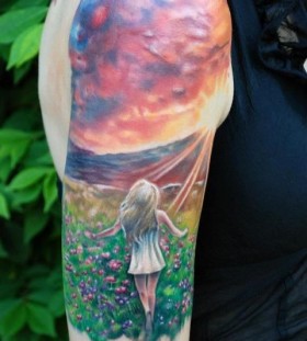 Sunset and girl tattoo by Kyle Cotterman
