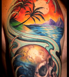 Sunset and skull tattoo